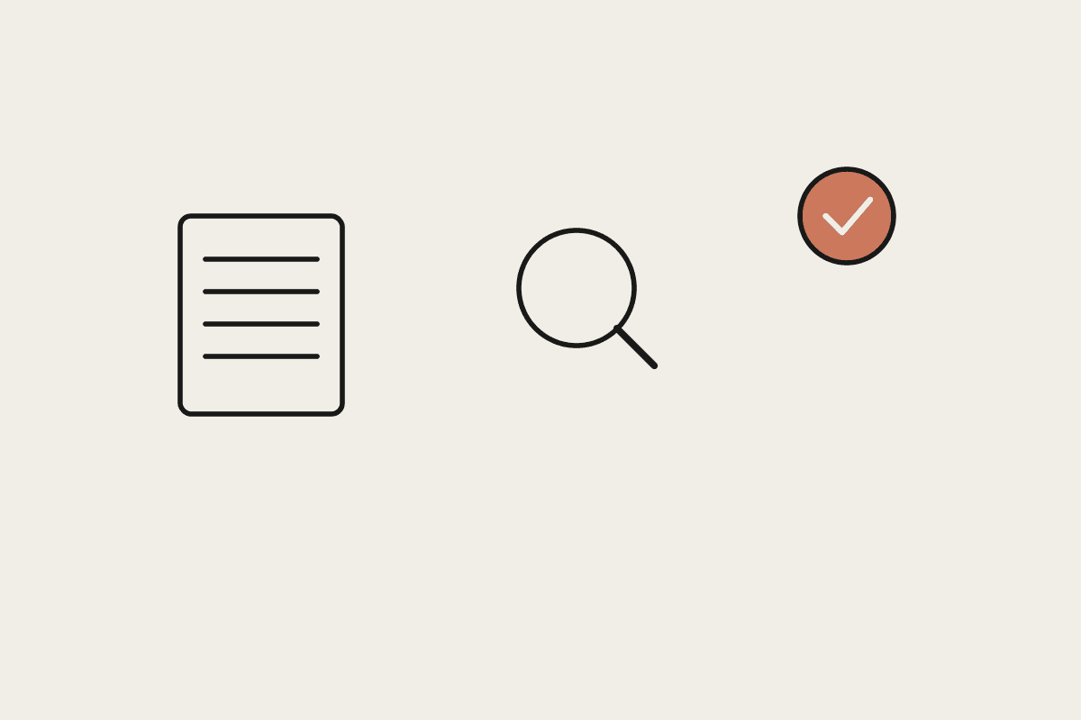 A document, a magnifying glass, and a terracotta check mark
