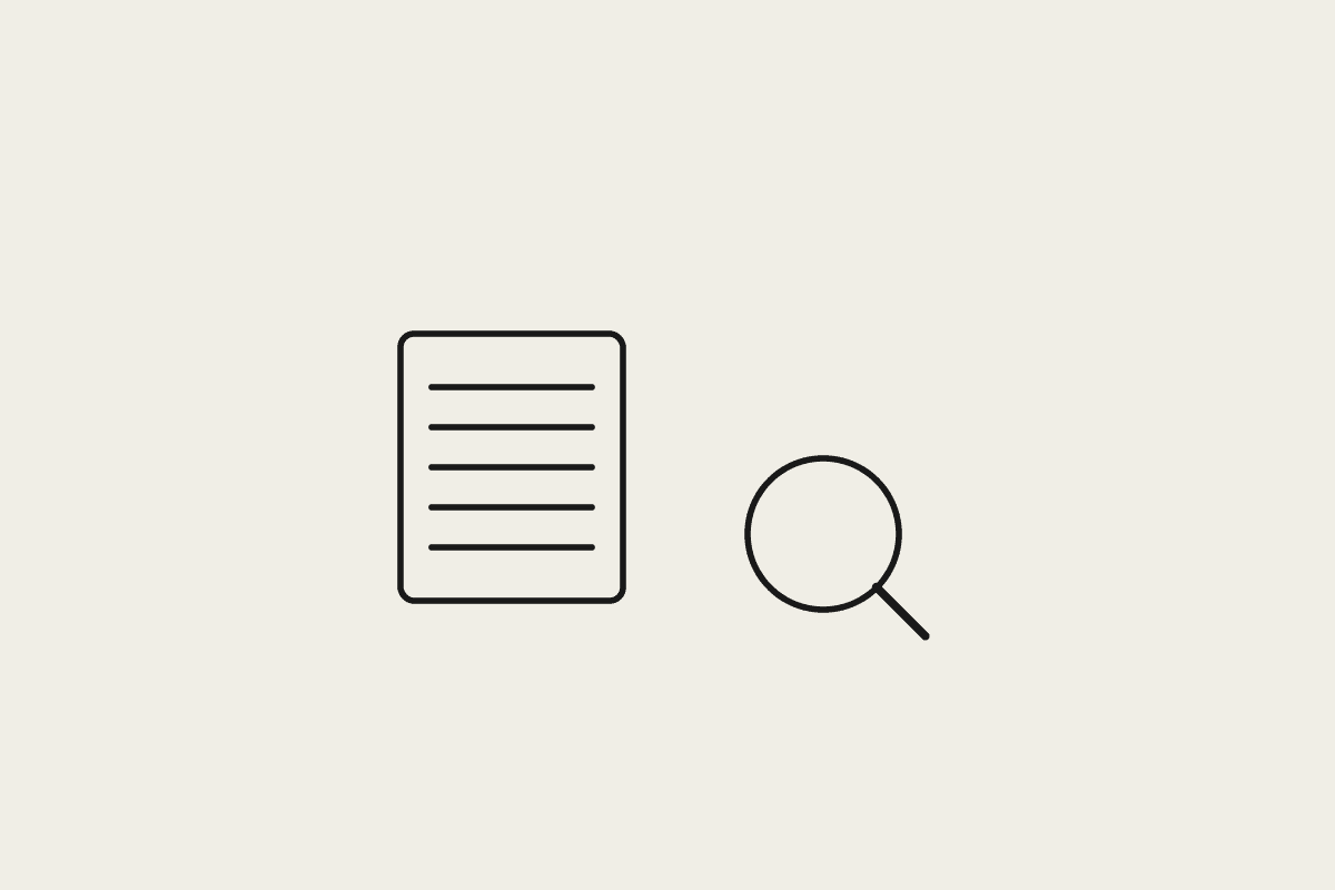 A document and a magnifying glass representing scrutinising an AI vendor's pricing page