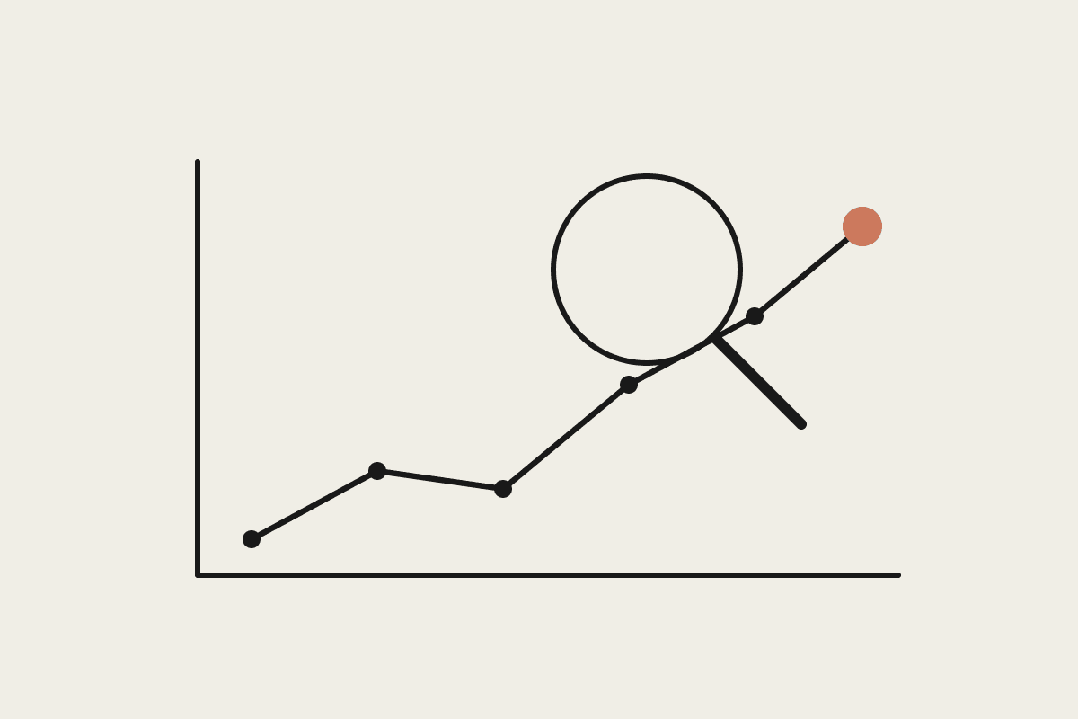 A hand-drawn rising line chart with a magnifying glass examining the trend and a terracotta data point