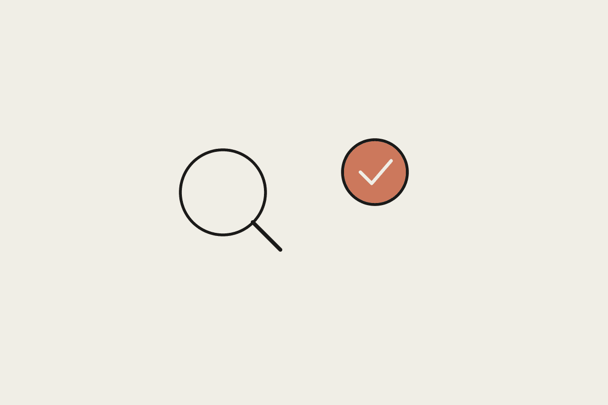 A magnifying glass and a check mark representing a workflow for fact-checking AI output before it goes out