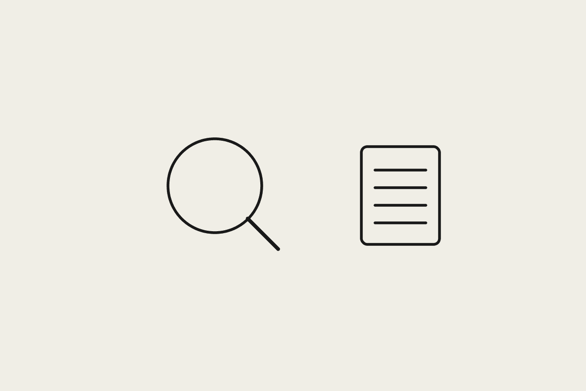A magnifying glass and a document representing an AI cost audit finding leaks