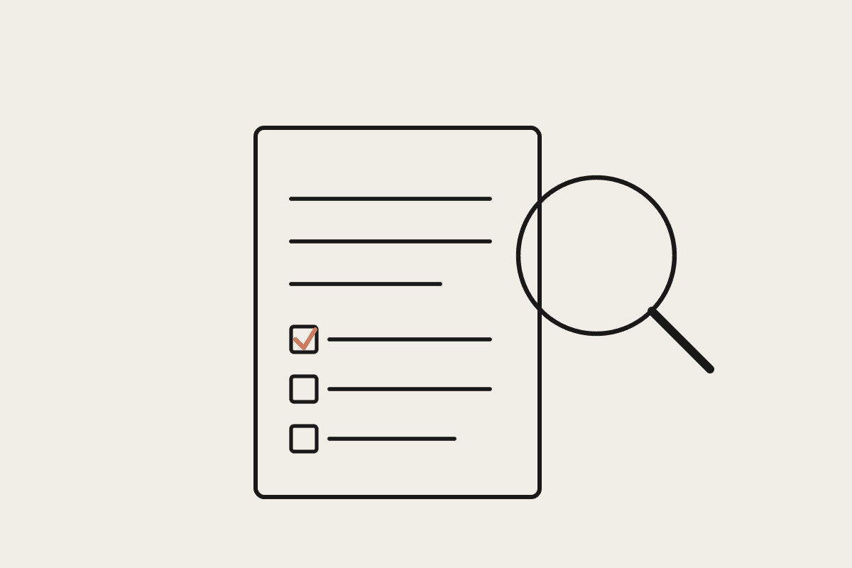 A magnifying glass inspecting a checklist document, one item ticked in terracotta