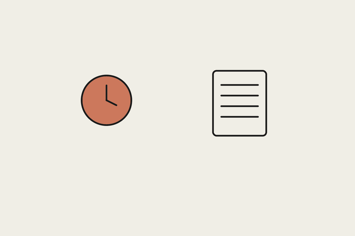 A terracotta clock beside a document
