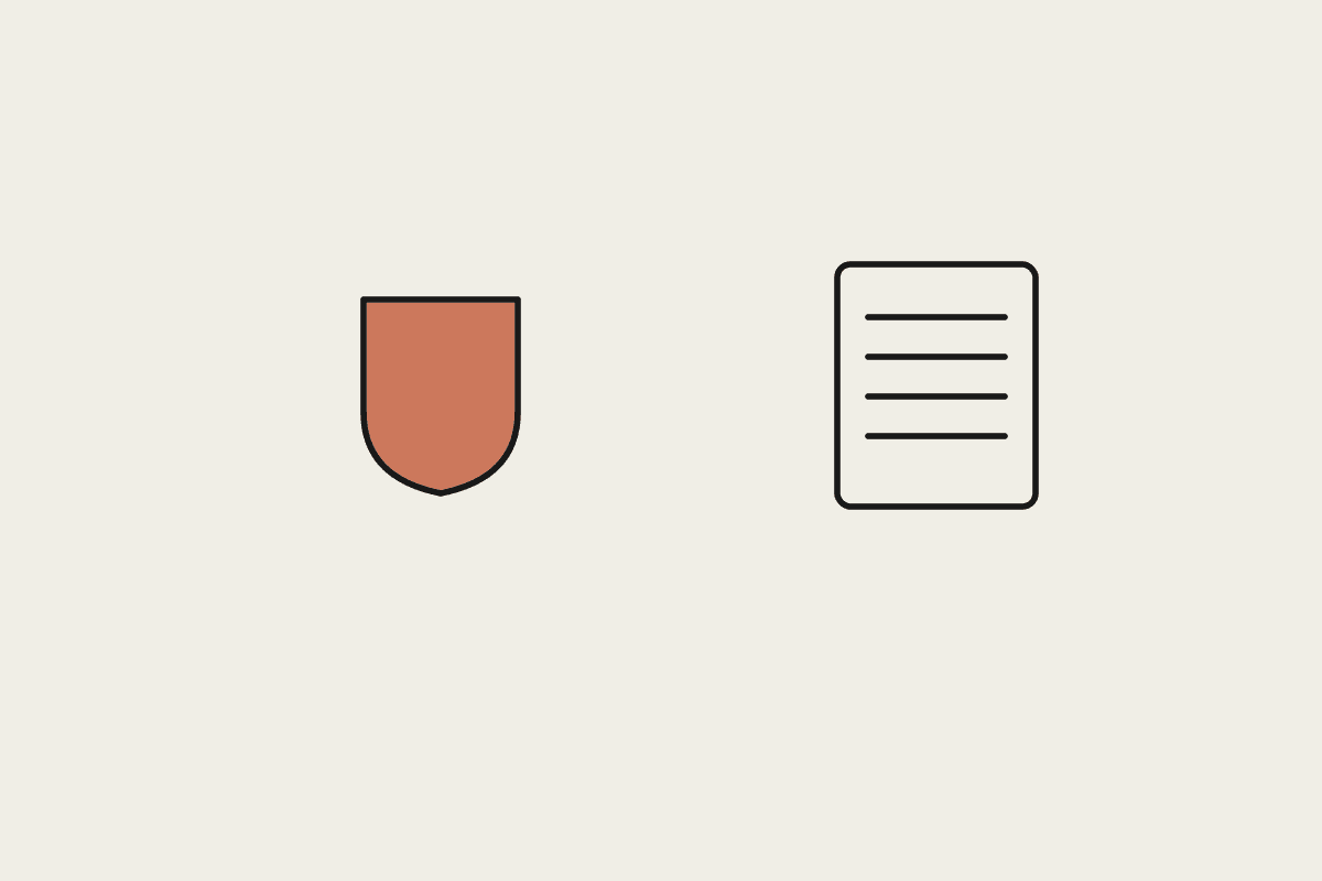 A terracotta shield beside a document