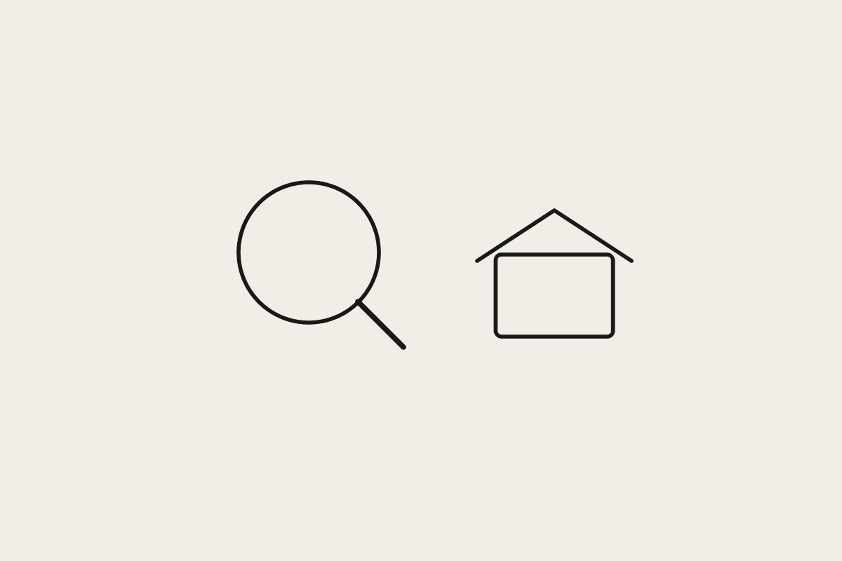 Illustration of a magnifying glass next to a simple house outline