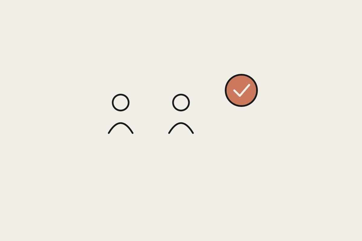 Illustration of two people and a check mark representing staff roles adapting alongside AI automation