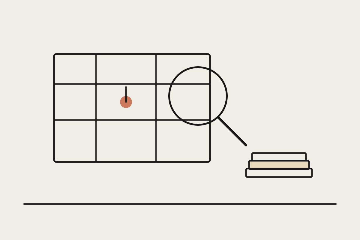 Line drawing of a site plan with a magnifying glass over it and a terracotta location pin marking a development site
